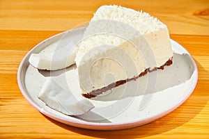 Delicious cheesecake with coconut on  plate