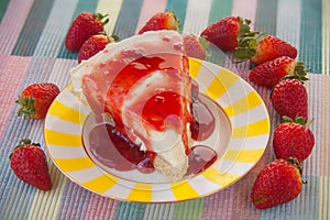 Delicious cheesecake with strawberries on  plate