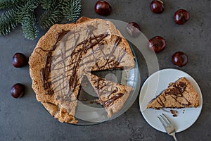 Delicious chestnut cake with almonds and chocolate glaze