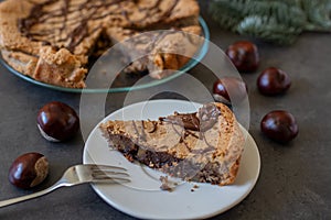 Delicious chestnut cake with almonds and chocolate glaze