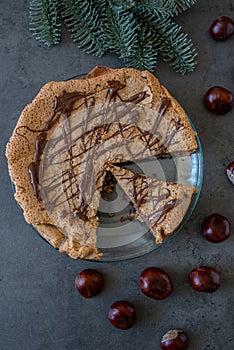 Delicious chestnut cake with almonds and chocolate glaze