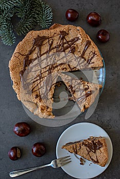 Delicious chestnut cake with almonds and chocolate glaze