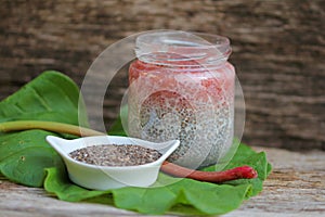 Delicious chia pudding spoon with rharbarber compote