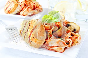 Delicious chicken breast with pasta