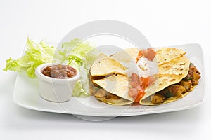 Delicious chicken quesadilla and fresh vegetables