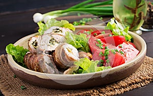 Delicious chicken rolls stuffed with cheese and spinach photo
