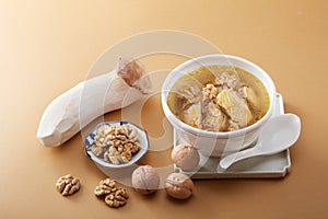 Delicious chicken soup with Pleurotus eryngii and walnut kernel