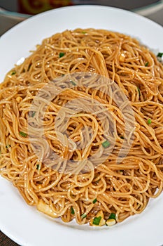 A delicious Chinese dish, dry fried round rice noodles