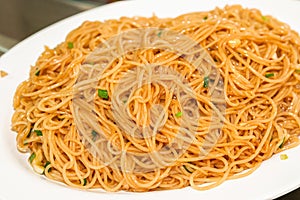 A delicious Chinese dish, dry fried round rice noodles