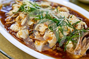 A delicious Chinese dish, steamed sea bass fillets