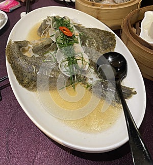 Delicious Chinese Food Macau Macao China Macanese Cuisine Hot Fresh Steamed Fish Dish lunch dinner meal Soy Sauce