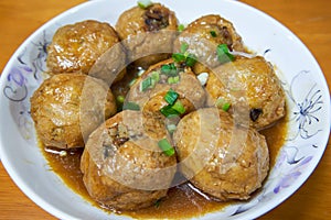 A delicious Chinese home-cooked dish, pork stuffed with avocado
