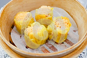 Delicious Chinese steamed shrimp dimsum in bamboo containers