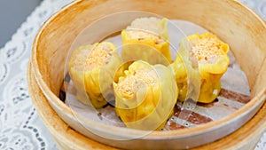 Delicious Chinese steamed shrimp dimsum in bamboo containers