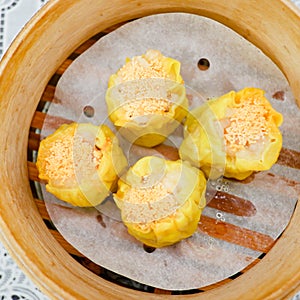 Delicious Chinese steamed shrimp dimsum in bamboo containers
