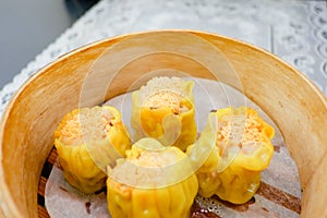 Delicious Chinese steamed shrimp dimsum in bamboo containers