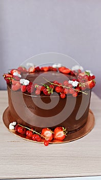 Delicious chocolate birthcake with fresh berries