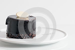 Delicious chocolate cake on white background