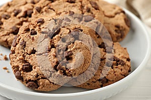 Delicious chocolate chip cookies on plate, closeup