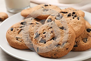 Delicious chocolate chip cookies on plate, closeup
