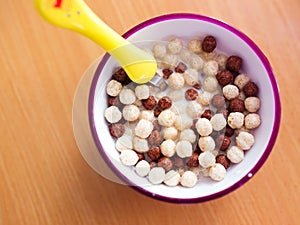 Delicious chocolate corn balls in milk.