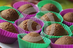 Delicious chocolate cupcakes in small baskets