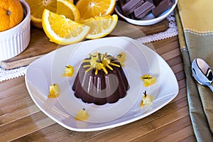 Delicious chocolate dessert with orange and cocoa