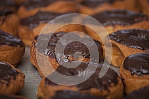 Delicious Chocolate Frosted Donut on Table