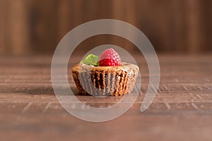 Delicious chocolate lava cake with fresh raspberries and mint