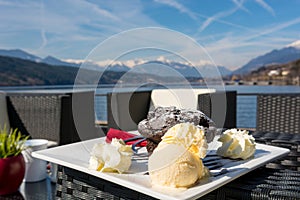 Delicious chocolate muffin served with vanilla ice cream.