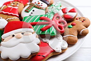 Delicious Christmas cookies on plate, closeup view