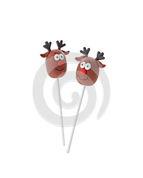 Delicious Christmas reindeer cake pops isolated on white