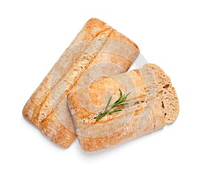 Delicious ciabattas with rosemary on white background, top view