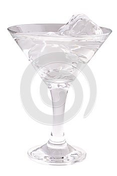 Delicious cocktail with ice cubes in martini glass on a white background.