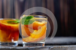 Delicious and cold peach cocktail