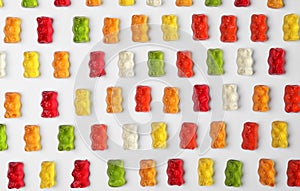 Delicious color jelly bears on white background