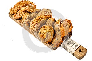 Delicious crispy fried breaded chicken parts. Isolated on white background, Top view.