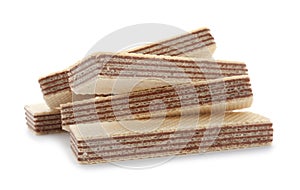 Delicious crispy wafers on white background