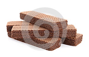 Delicious crispy wafers on white background.