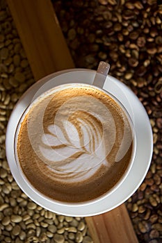 Delicious cup of capuchino coffee photo