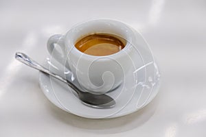 Cup of coffee over white background