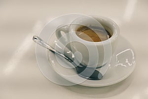 Cup of coffee over white background