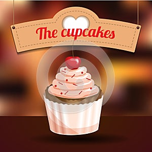 Delicious cupcake with dessert cherry and sugar powder