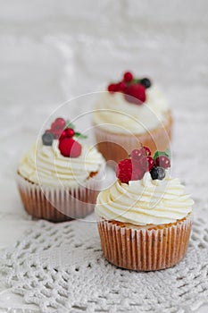 Delicious cupcakes with berries