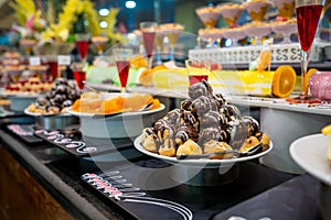 A delicious dessert buffet with various sweet bakery in a restaurant or hotel