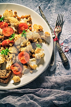 Delicious dinner cauliflower baked chickpeas tomatoes meat art toasts