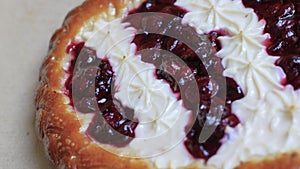 Delicious dough cake with tender curd and juicy cherry jelly