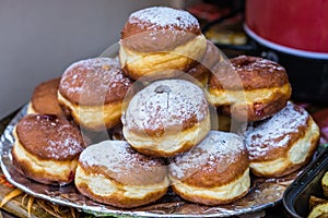 Delicious doughnuts on plate