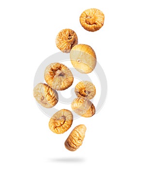 Delicious dried figs in the air isolated on a white background