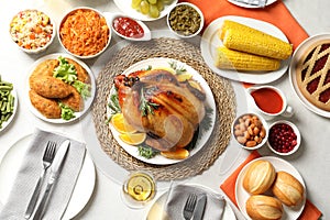 Delicious festive dinner with roasted turkey on table